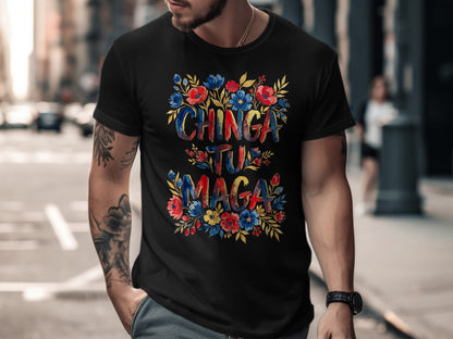 Black t-shirt with "Chinga Tu Maga" text surrounded by floral designs.