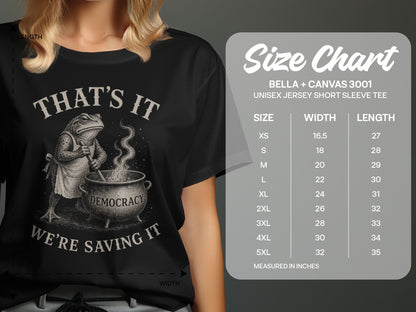 T-shirt with a frog in an apron stirring a pot, text reads "That's It, Democracy, We're Saving It."