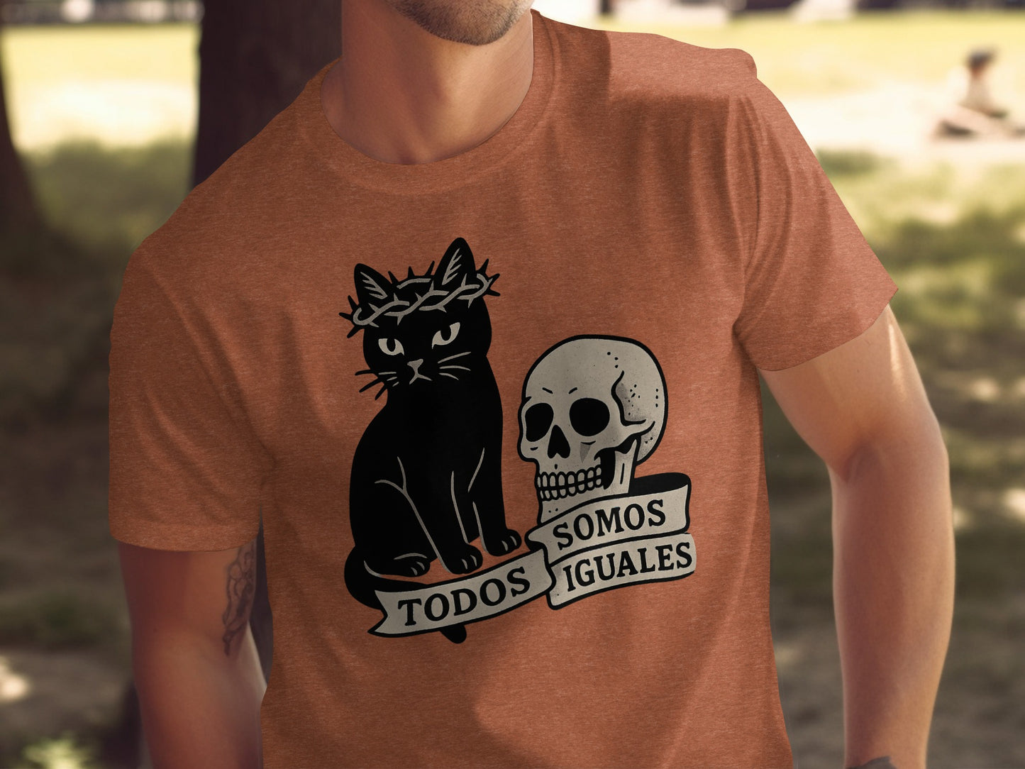 Cat and Skull Todos Somos Iguales Graphic Shirt product type