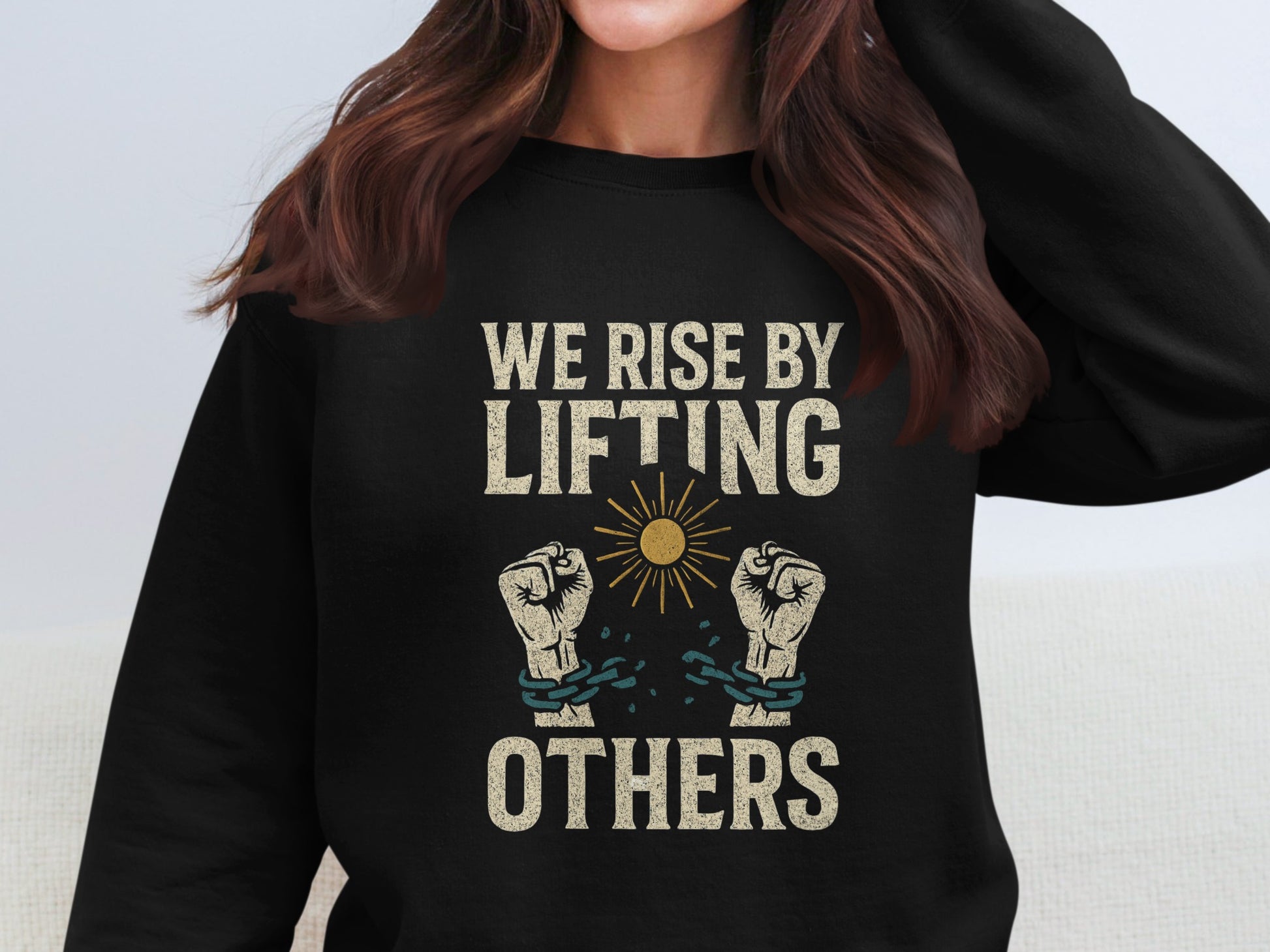 We Rise By Lifting Others Graphic Sweatshirt product
