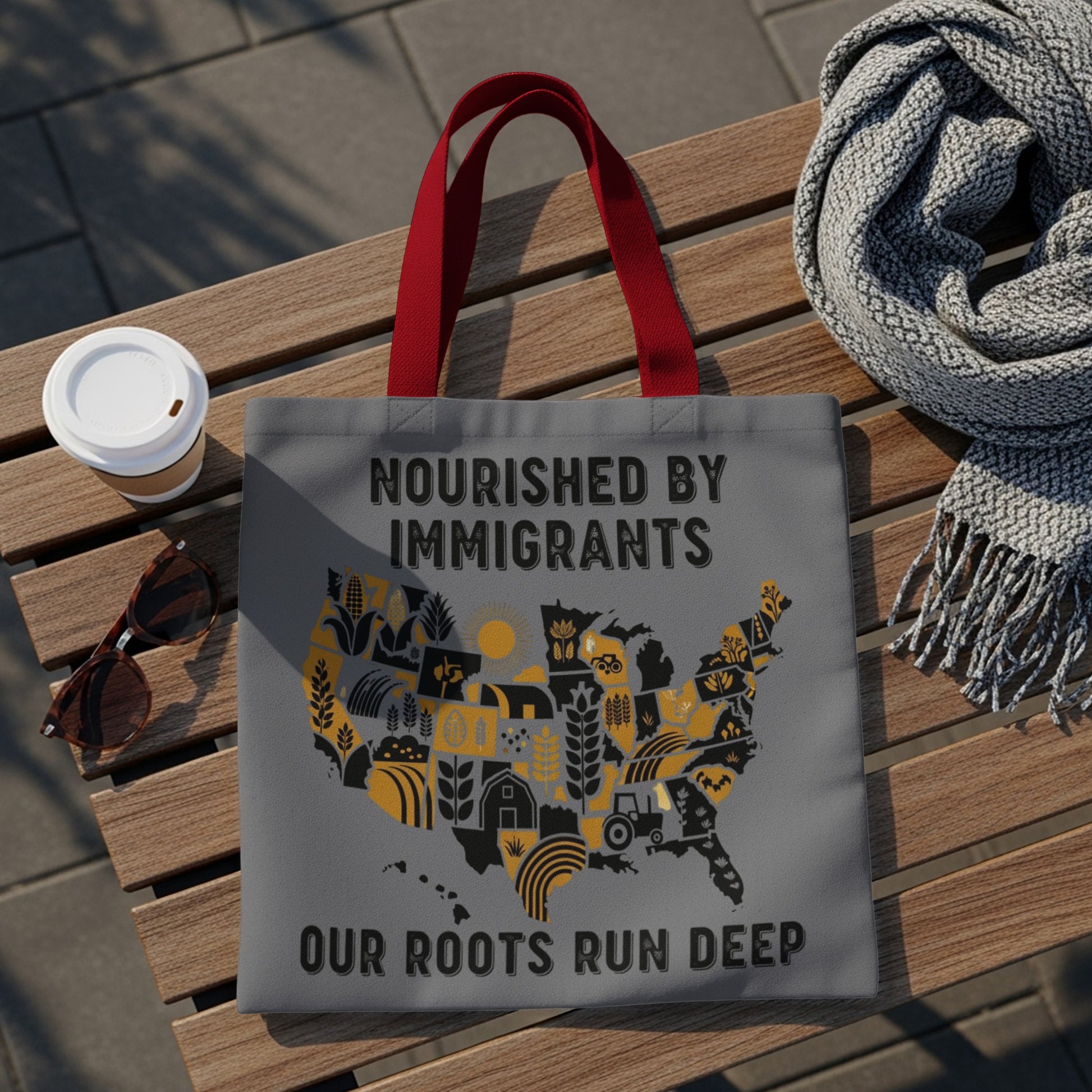 Tote bag featuring a map of the USA filled with farm icons, reads "Nourished by Immigrants. Our Roots Run Deep."