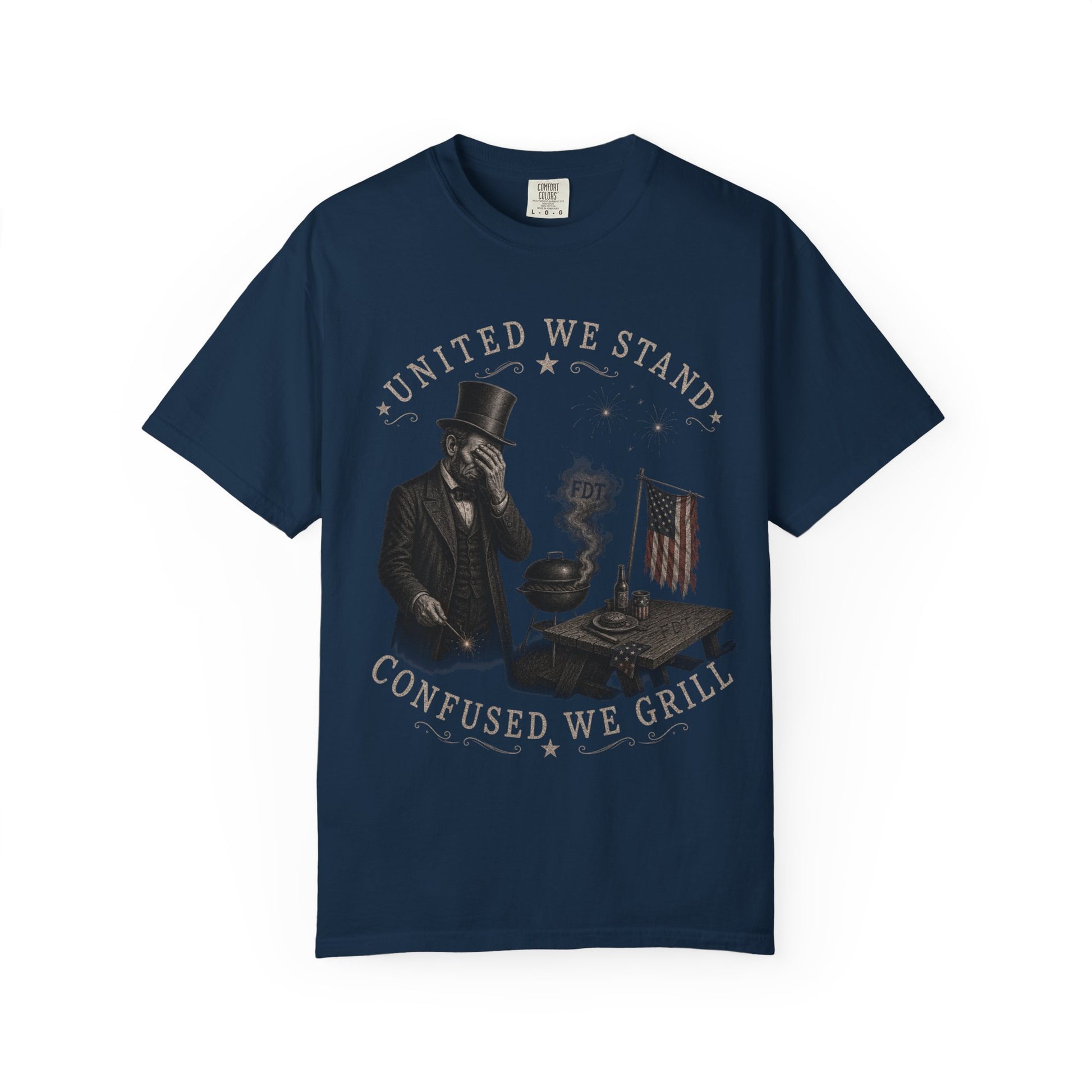 Navy t-shirt with "United We Stand, Confused We Grill" text and patriotic grilling graphic.