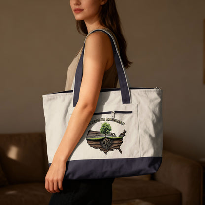 Tote bag with a map of the US made of soil and a tree.