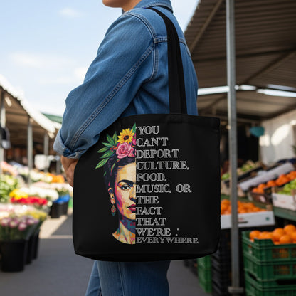Black tote bag with Frida Kahlo and quote about culture, food, and music.