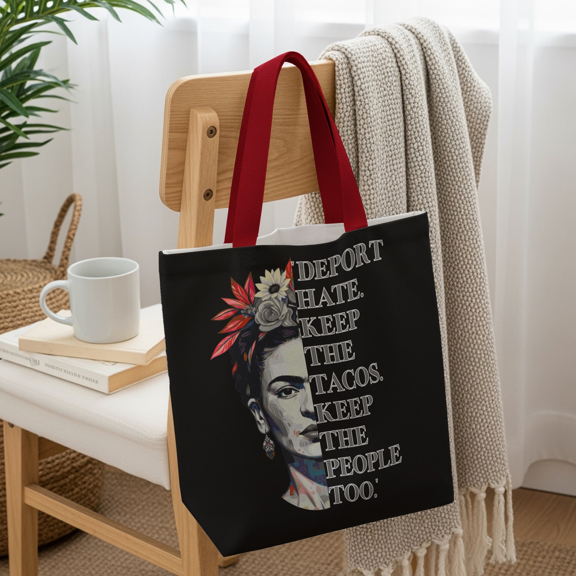 Black tote bag with Frida Kahlo and text "DEPORT HATE KEEP THE TACOS THE PEOPLE TOO".