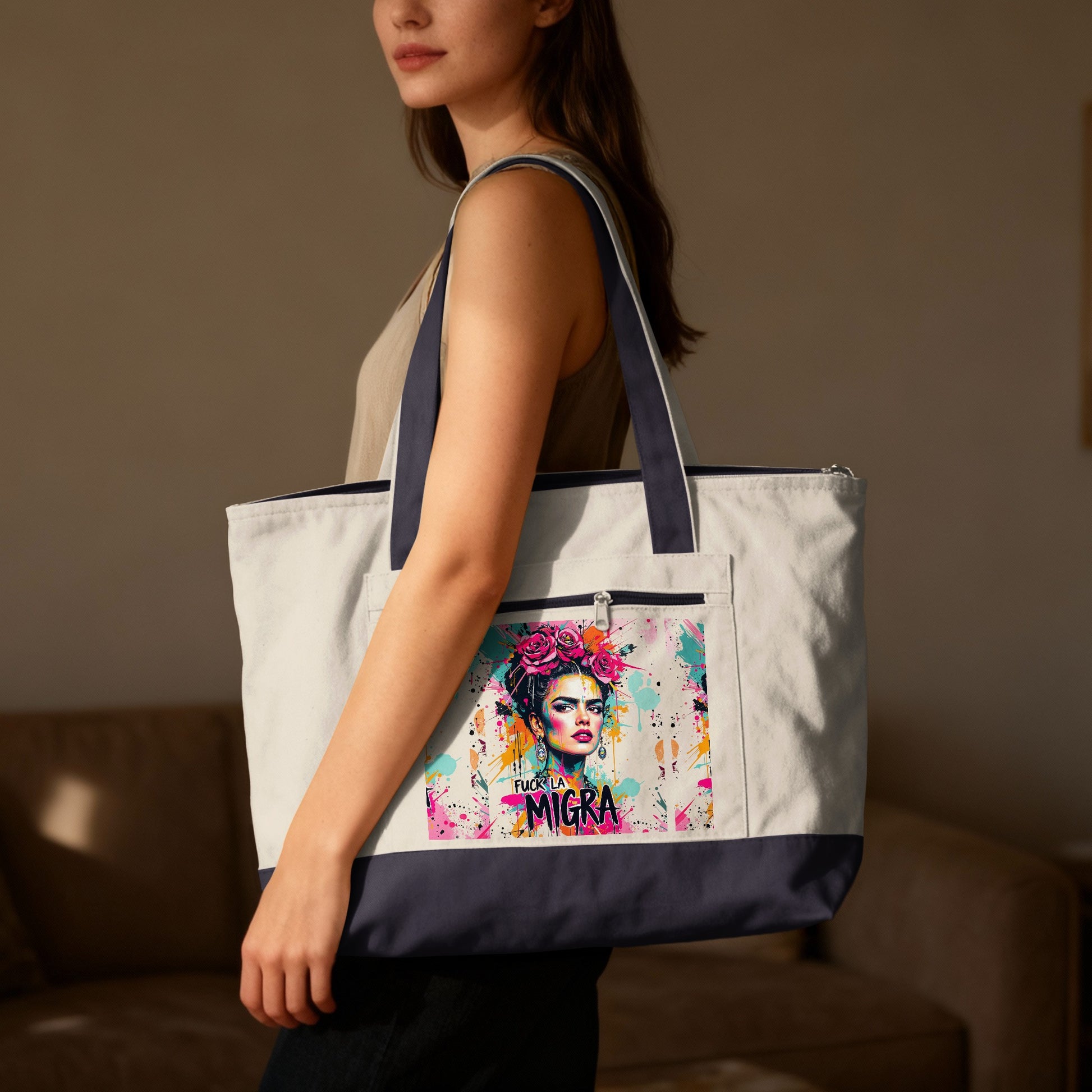 Tote bag with Frida Kahlo artwork and "F U C K L A M I G R A" text.