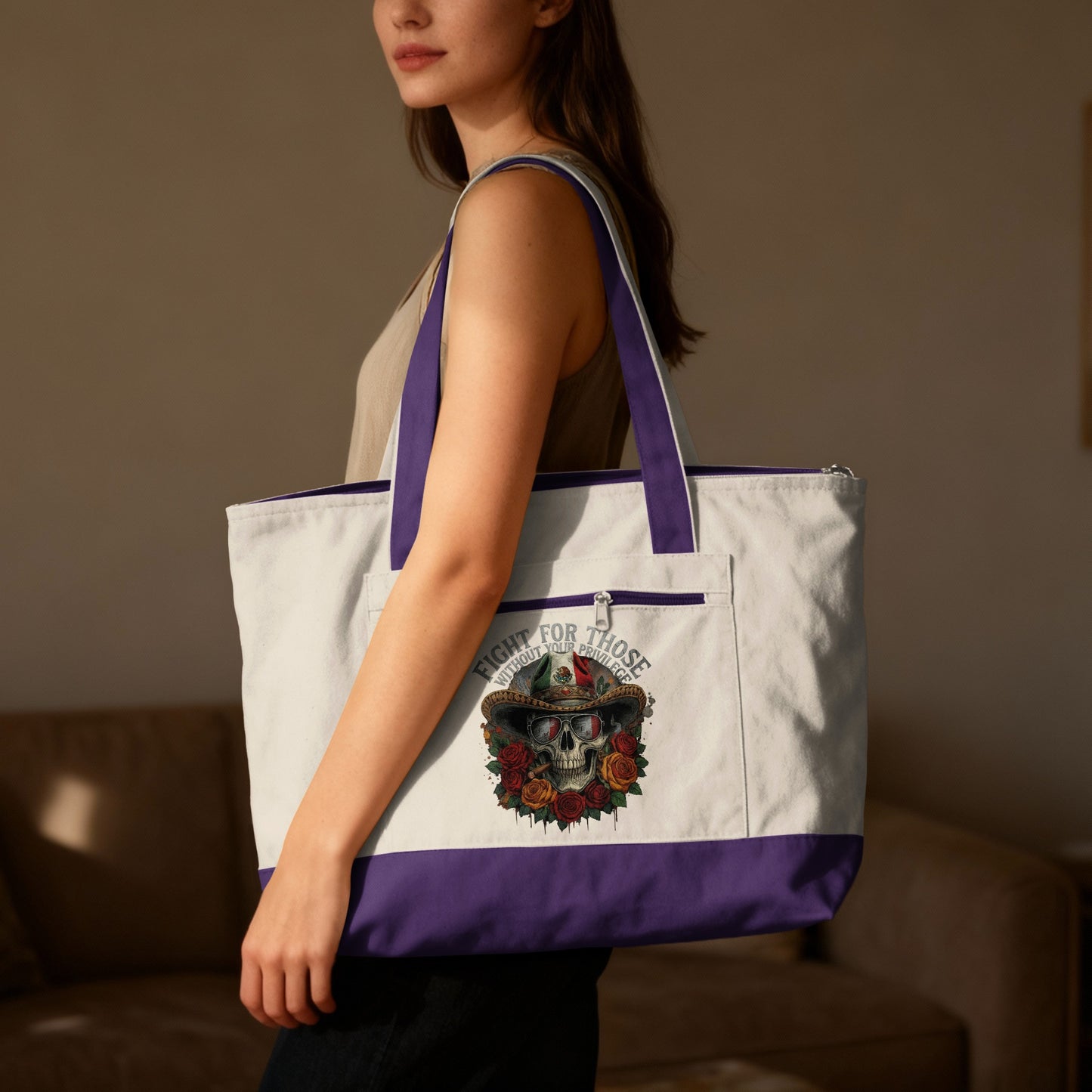 White tote bag with purple trim and a Dia de los Muertos skull design.