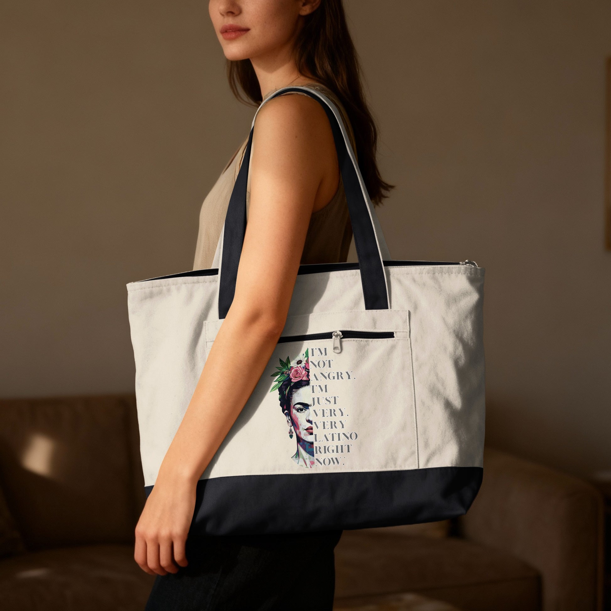 Tote bag with Frida Kahlo graphic and quote.