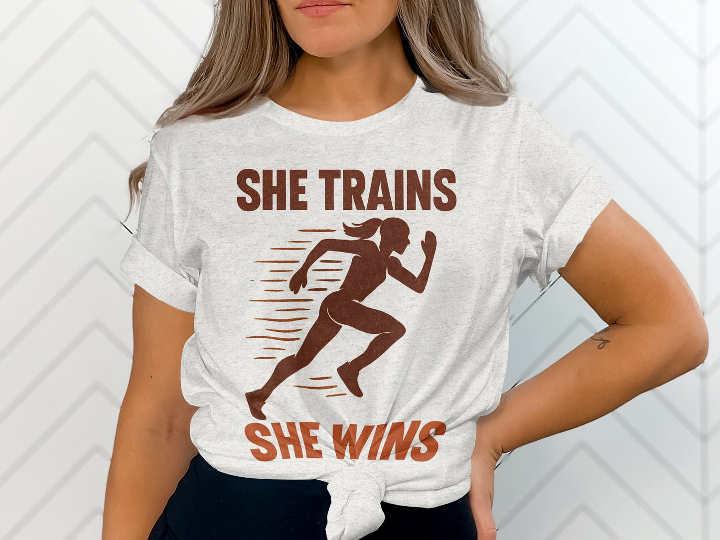 Motivational She Trains She Wins Running Graphic Tee