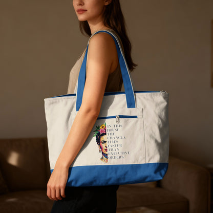 Tote bag with Frida Kahlo graphic and "In this house the changla vibes..." text.