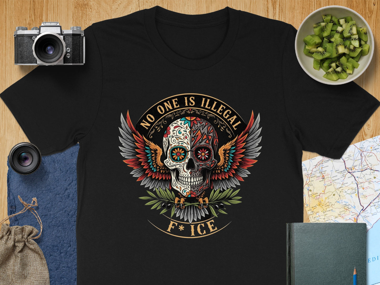 No One Is Illegal Winged Skull Graphic T-Shirt product
