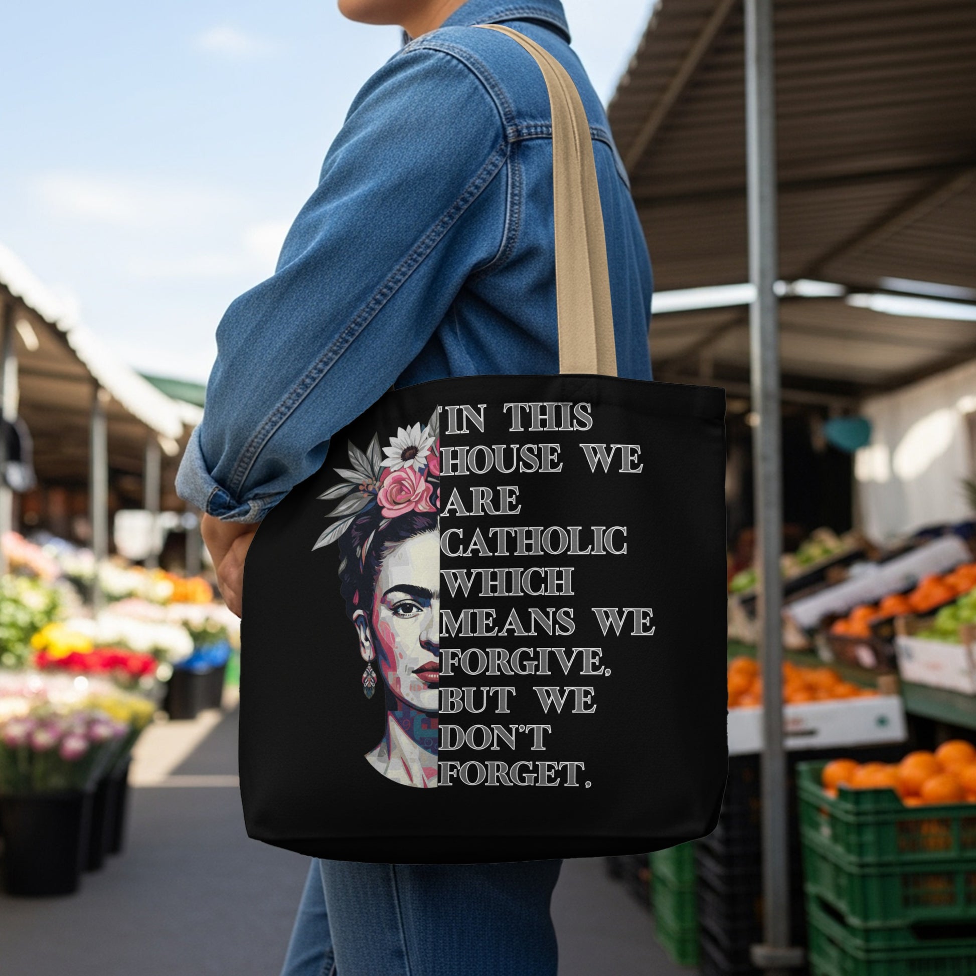 Tote bag with Frida Kahlo portrait and text about forgiveness.