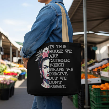 Tote bag with Frida Kahlo portrait and text about forgiveness.