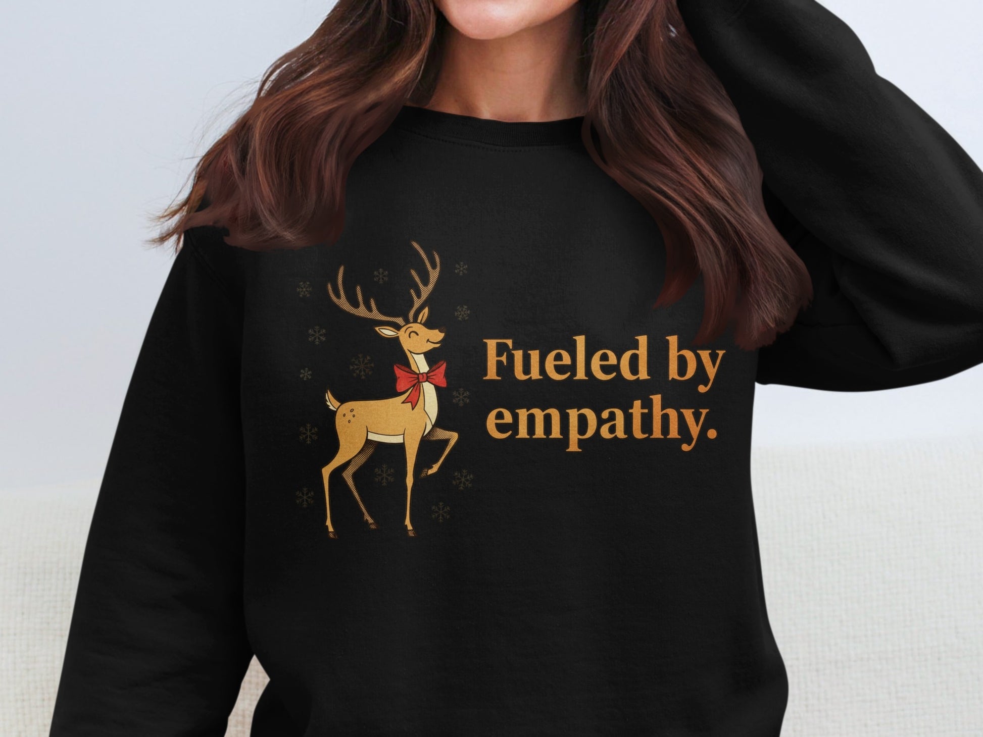Fueled by empathy reindeer with red bow product