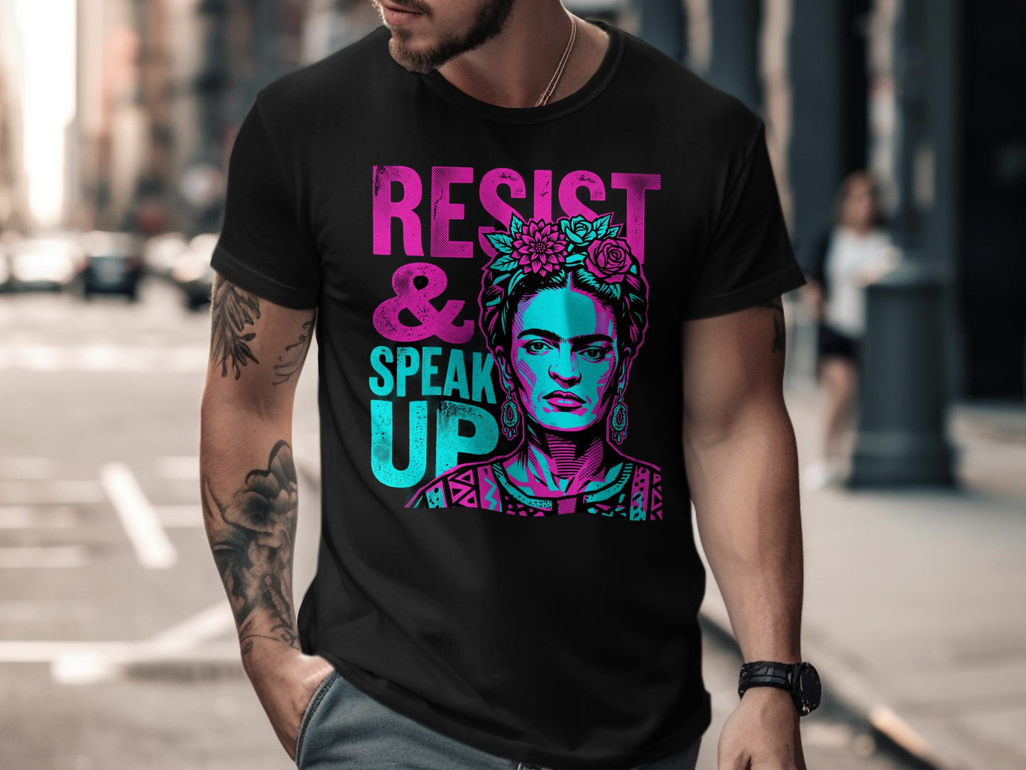 Black t-shirt with Frida Kahlo portrait and "RESIST & SPEAK UP" text.