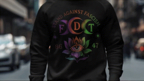 a person wearing a black hoodie with a colorful design on the back, including a lotus flower and an eye symbol.