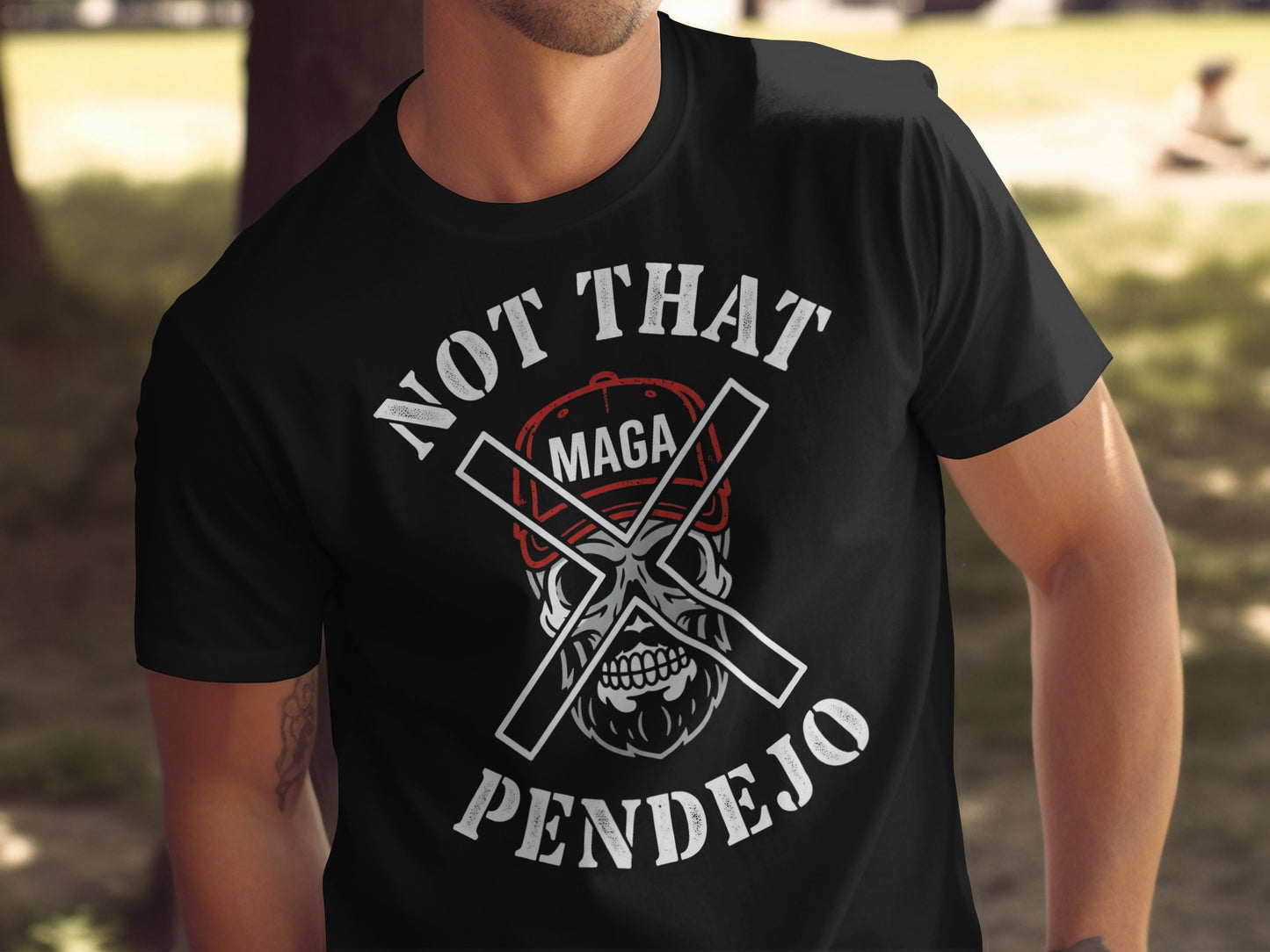 Black t-shirt with "NOT THAT PENDEJO" and crossed MAGA hats.