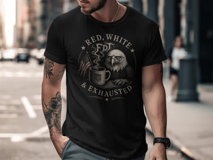Black t-shirt with patriotic eagle, coffee mug, and text "RED, WHITE & EXHAUSTED".