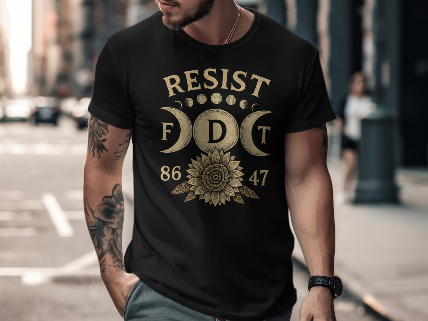 Black t-shirt with "RESIST" and a sunflower design.