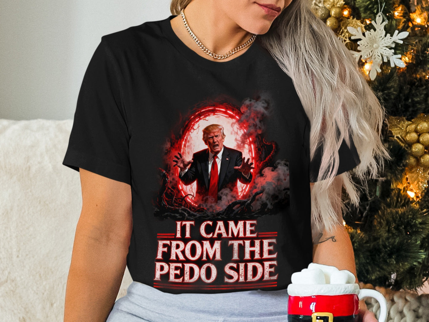 Black t-shirt with Trump, demonic imagery, and text "IT CAME FROM THE PEDO SIDE".