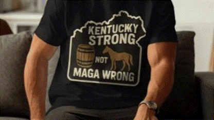 A person wearing a black t-shirt with a graphic design that says "Kentucky Strong Not MAGA WRONG".