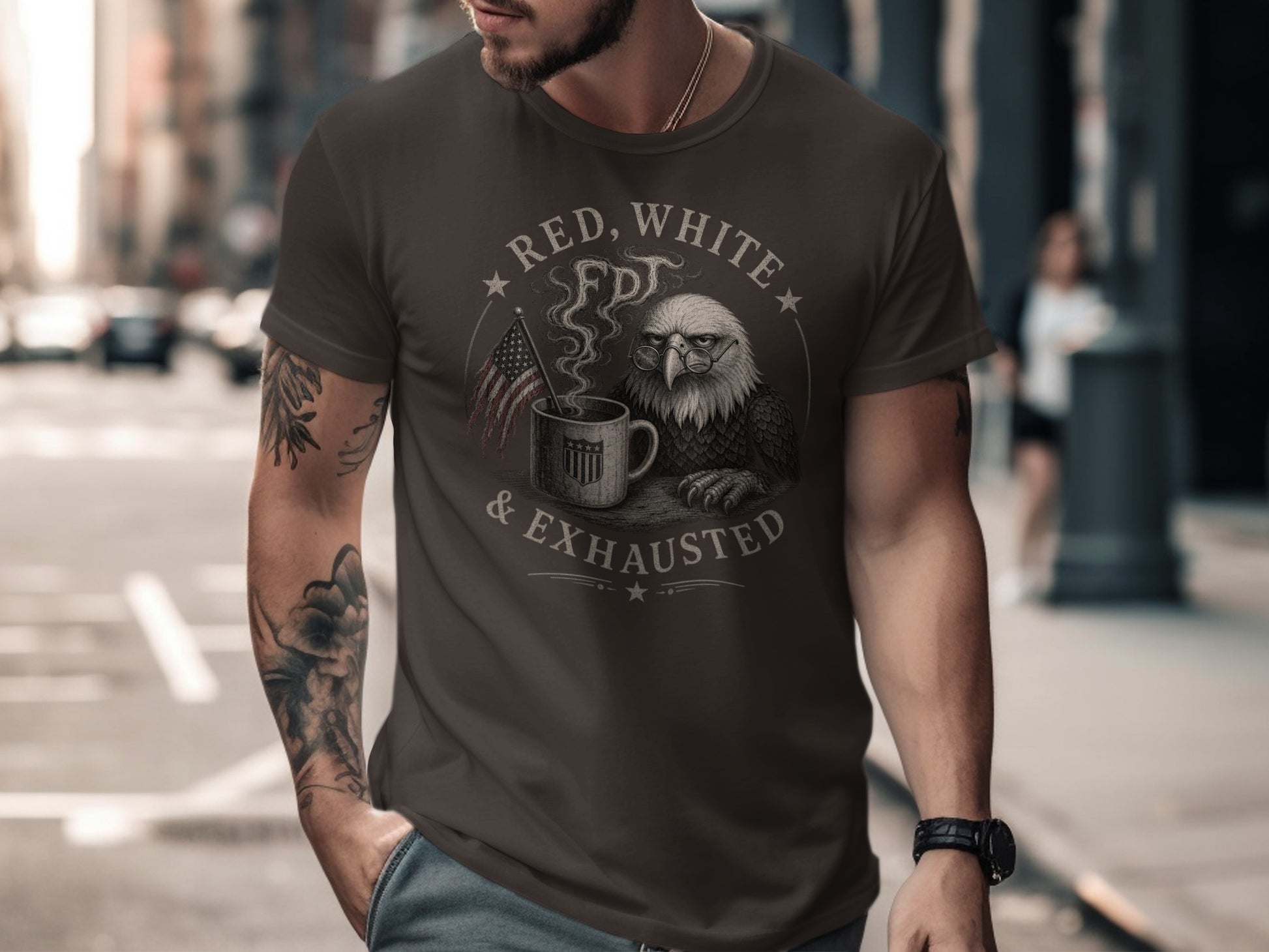 Brown t-shirt with eagle, coffee cup, and "Red, White & Exhausted" text.