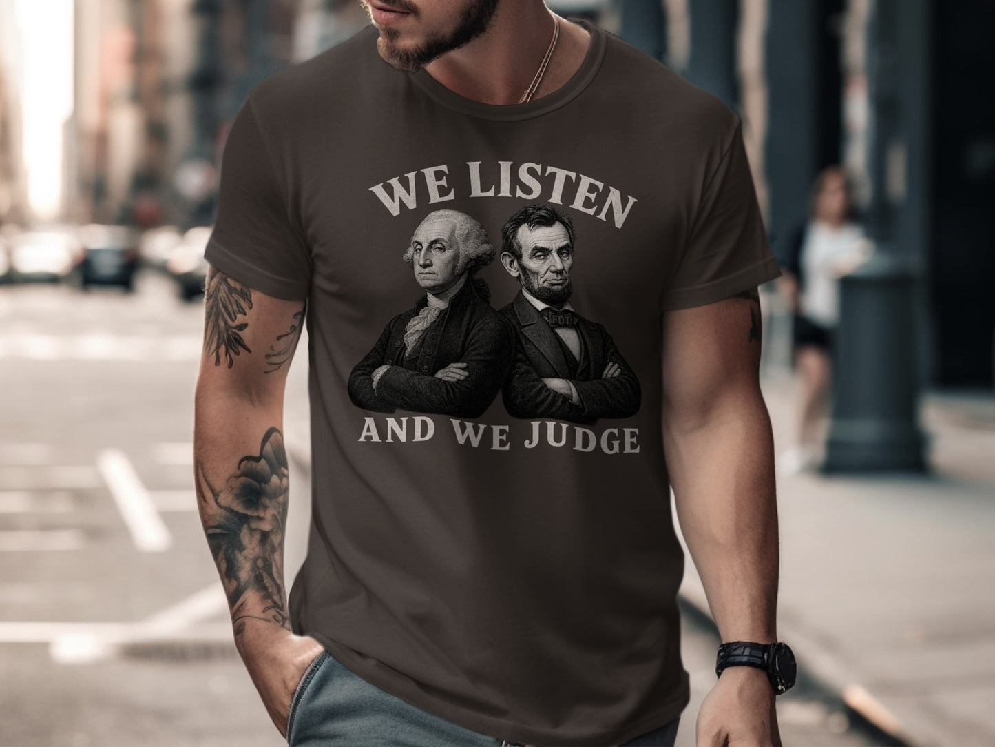 Dark t-shirt with George Washington and Abraham Lincoln illustration and text "WE LISTEN AND WE JUDGE".