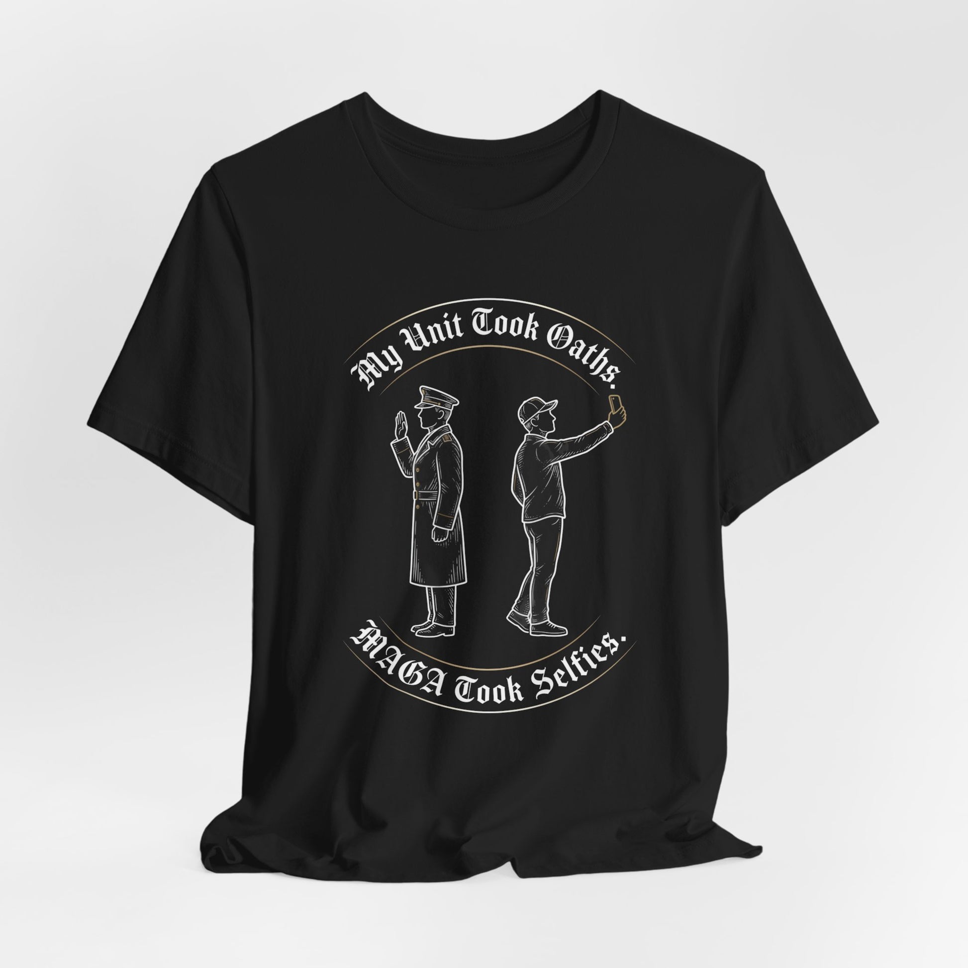 T-shirt with white text "My Unit Took Oaths. MAGA Took Selfies." and line drawing of two men.