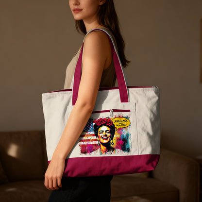 Woman with Frida Kahlo-inspired graphic on a tote bag.