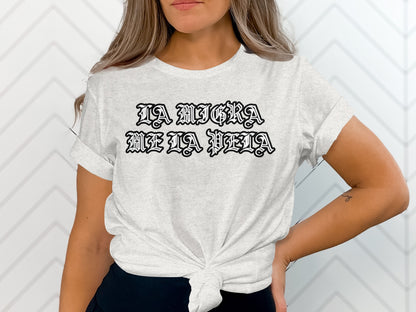 LA MIGRA ME LA PELA Bold Lettering Graphic Tee