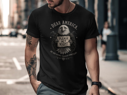 Black t-shirt with "Dear America, Please Act Right" eagle graphic.