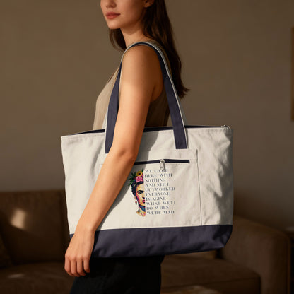 Tote bag with Frida Kahlo graphic and motivational quote.