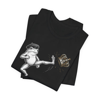Black t-shirt with a frog kicking a crown with a beret.