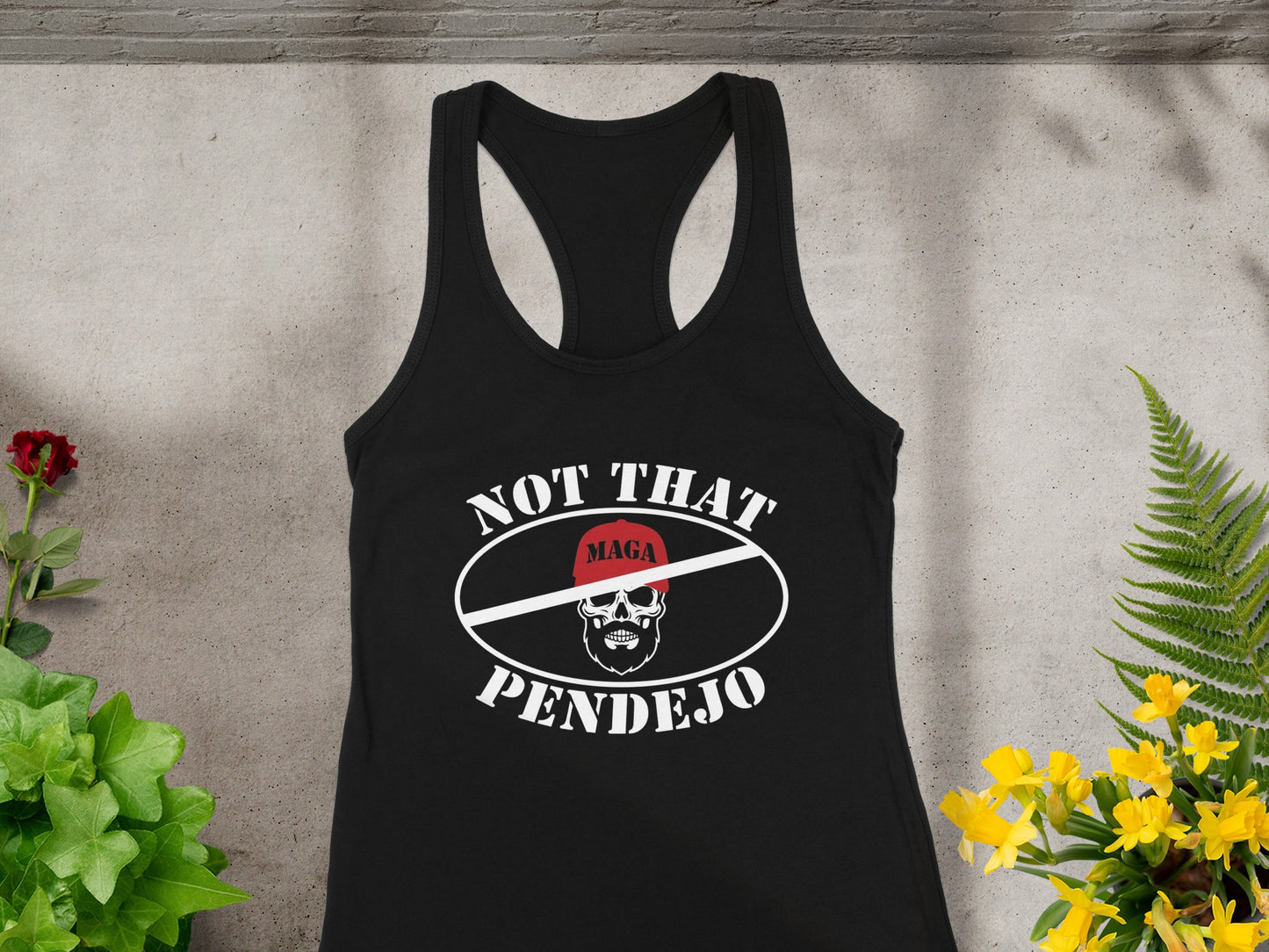 Black tank top with "NOT THAT PENDEJO" text and skull graphic.