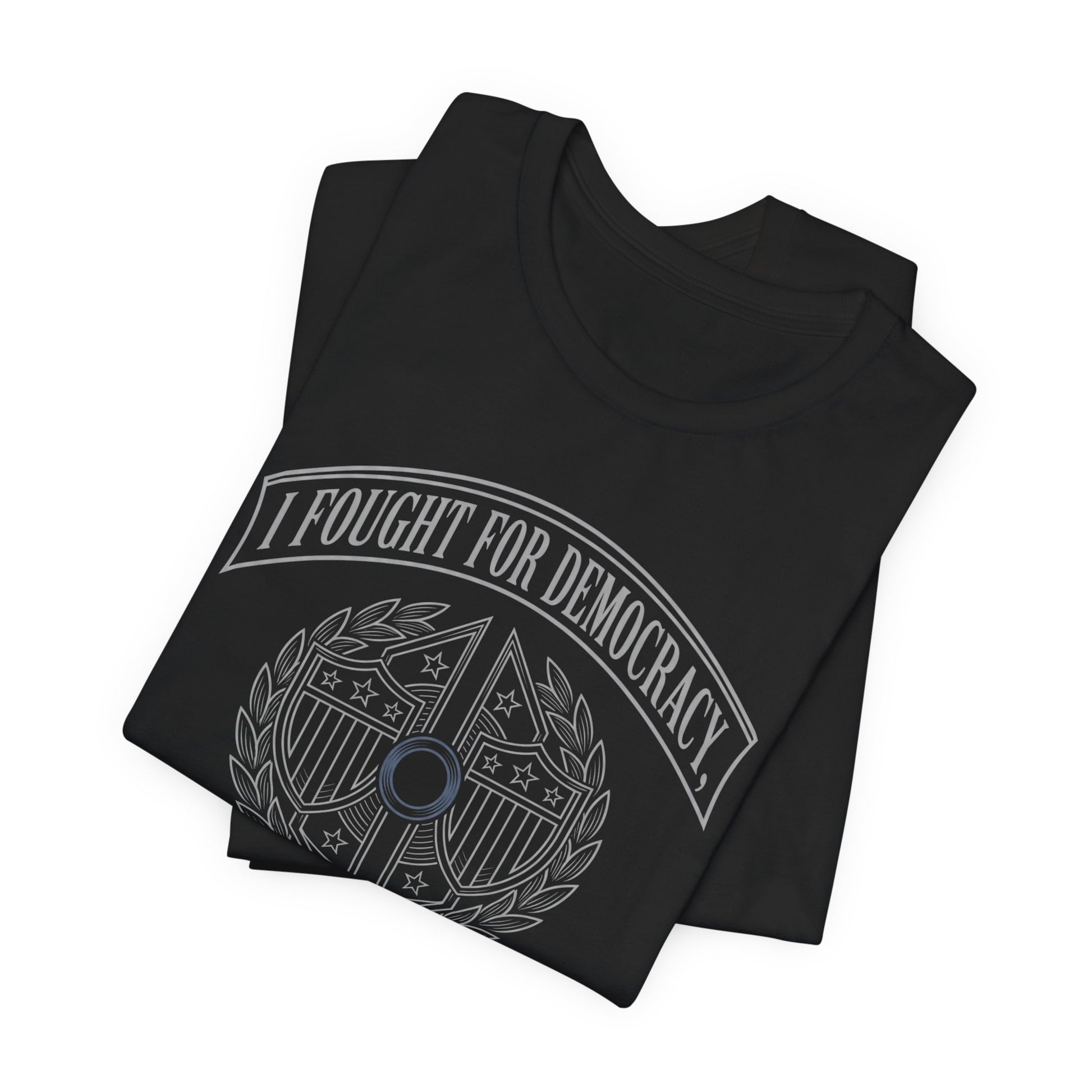 Black t-shirt with white text and crest that reads "I Fought For Democracy".