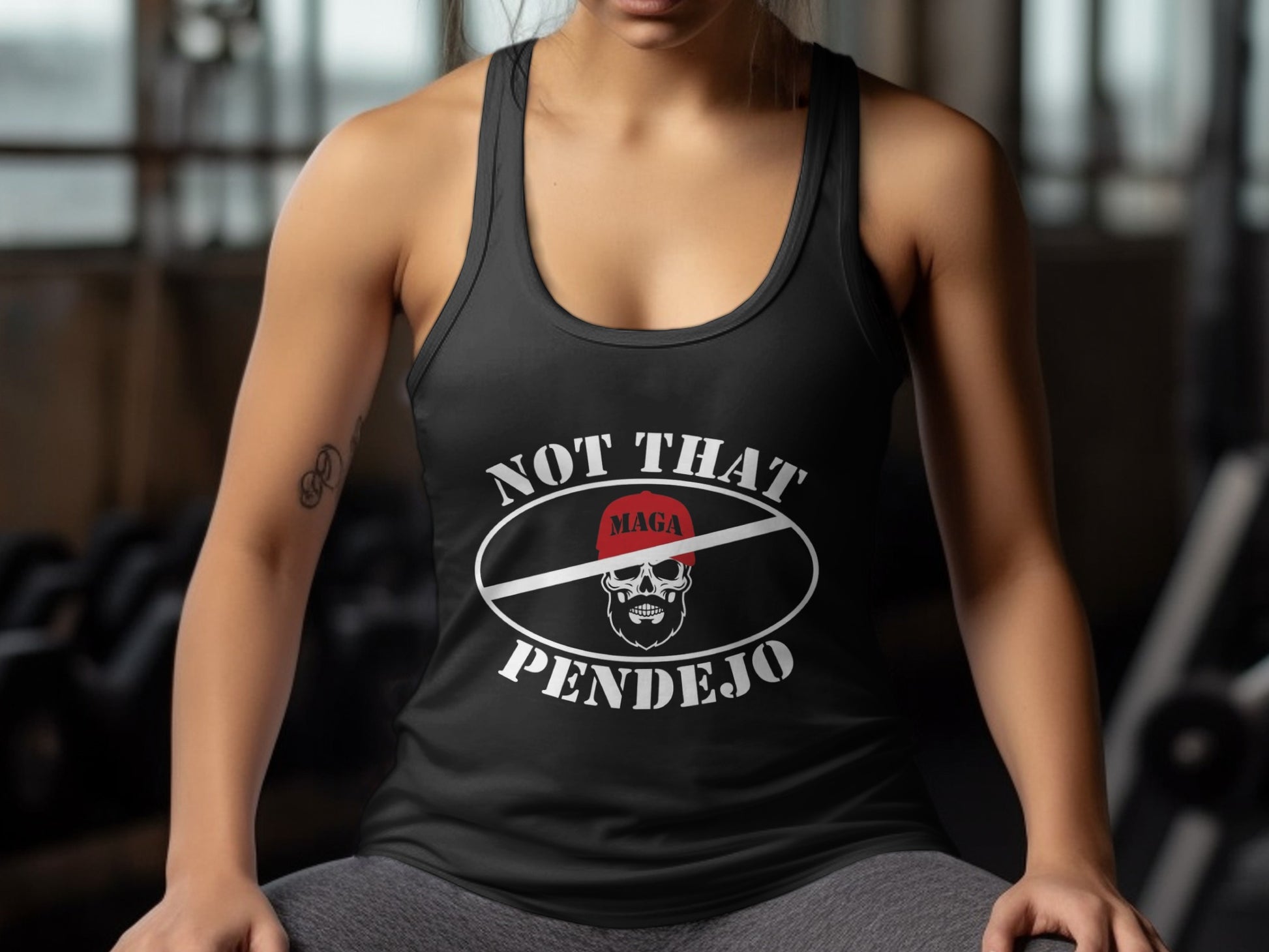 Woman wearing a tank top with "Not That Pendejo" and a skull logo.