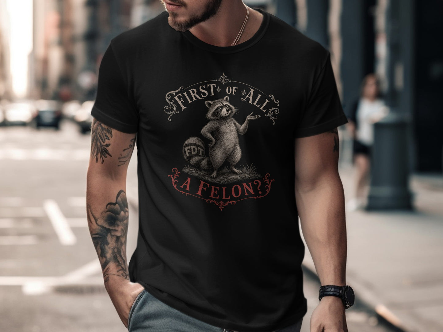 Black t-shirt with "First of all, a felon?" text and FDT logo.