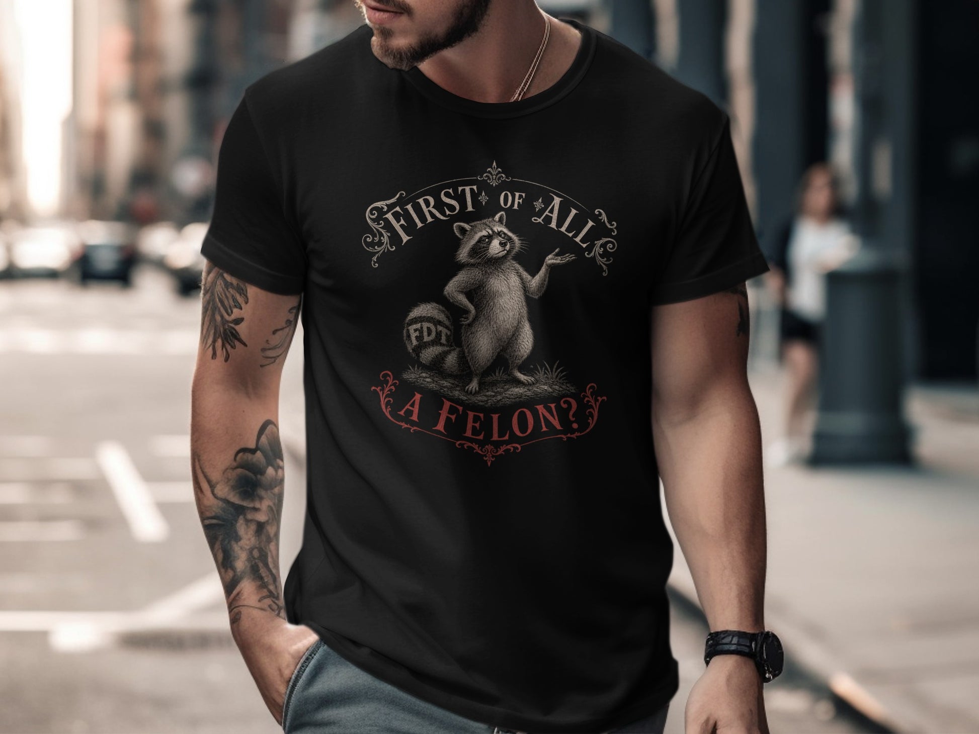 Black t-shirt with "First of all, a felon?" text and FDT logo.