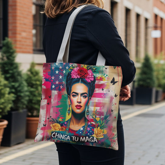 Frida Kahlo tote bag with colorful American flag background and text.