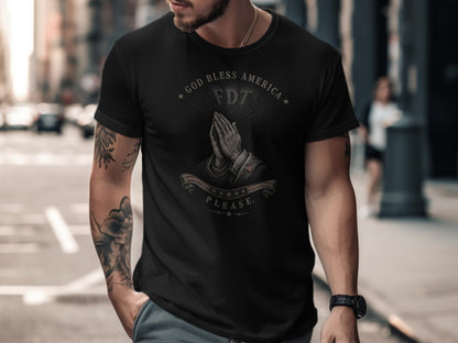 Black t-shirt with praying hands and "God Bless America" text.