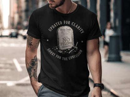 Black t-shirt with "UPDATED FOR CLARITY" and "NO FELONS, OBVIOUSLY" text.