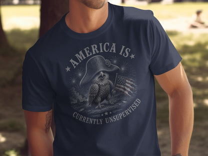 Eagle wearing a hat holds American flag, "America is currently unsupervised" text.