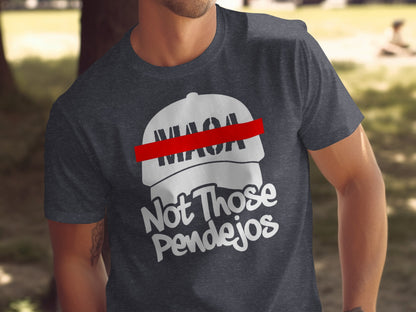 Dark t-shirt with "MAGA Not Those Pendejos" and a red-lined cap graphic.