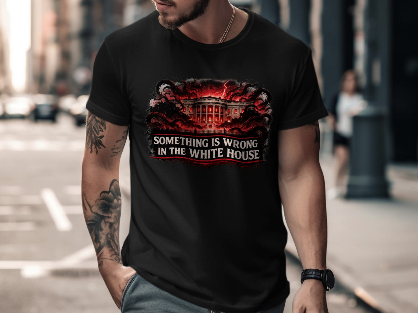Black t-shirt with white text and red, dark graphics of the White House.