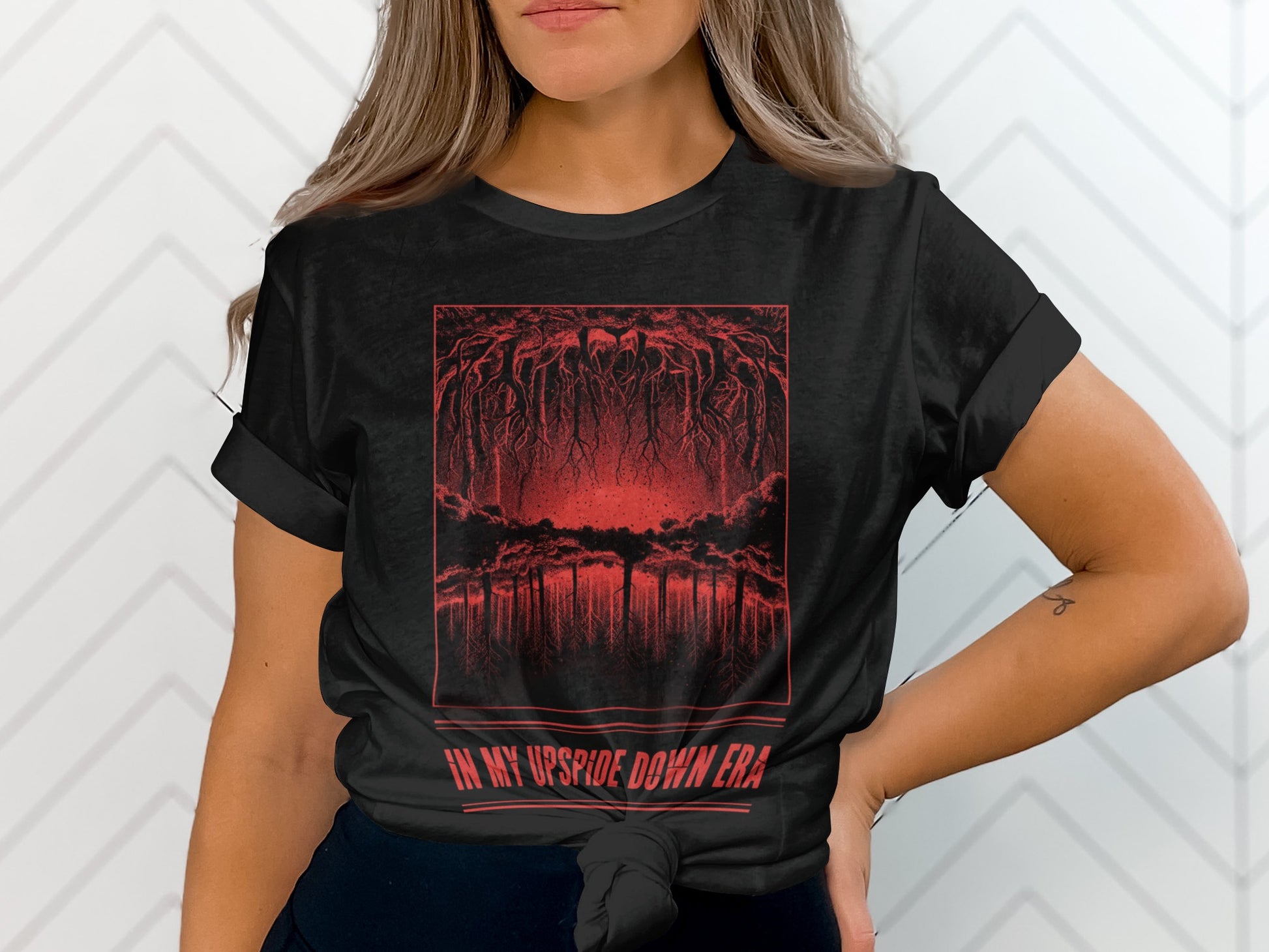 Black t-shirt with red Upside Down forest graphic and text "IN MY UPSIDE DOWN ERA".