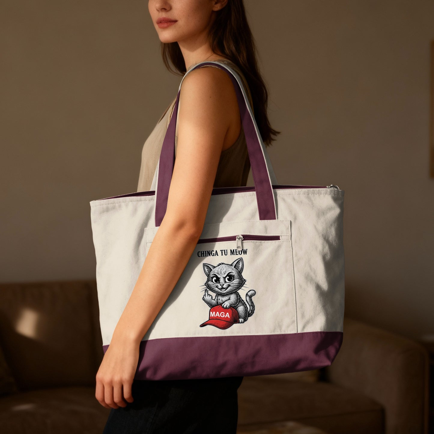 White tote bag with cat graphic and "CHINGA TU MEUW MAGA" text.