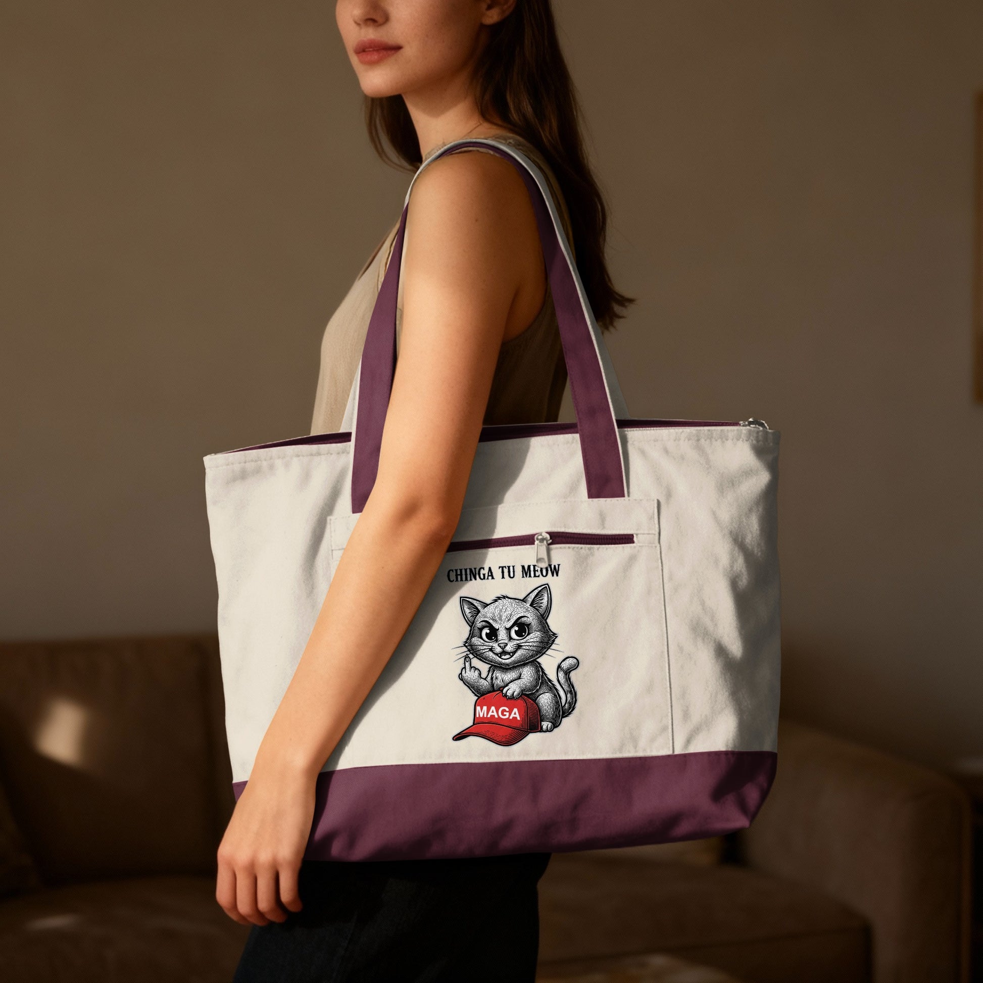 White tote bag with cat graphic and "CHINGA TU MEUW MAGA" text.