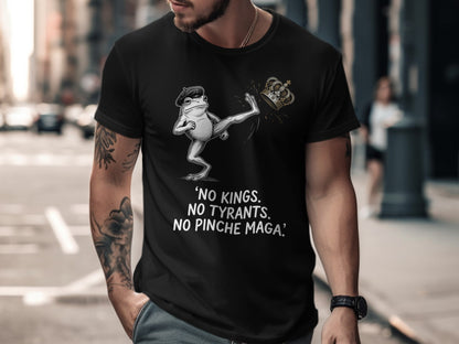 Black t-shirt with frog kicking crown, text "NO KINGS. NO TYRANTS. NO PINCHE MAGA."