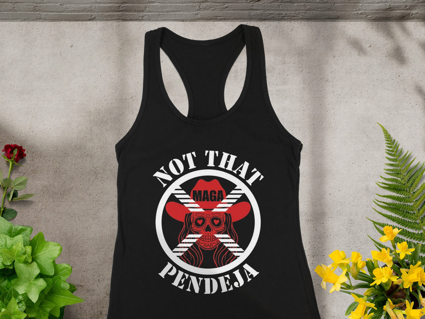 Black tank top with "NOT THAT PENDEJA" and crossed-out skull in cowboy hat.