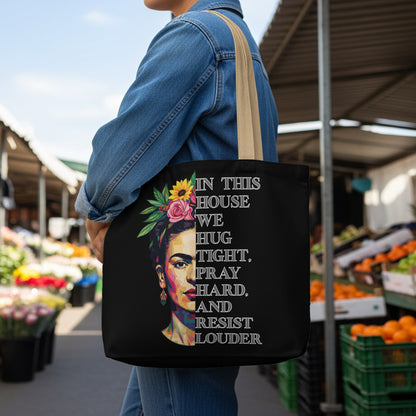 Tote bag with Frida Kahlo portrait and empowering text in English.